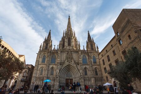 Barcelona, Spain - January 02 2017: Some people are walking on the square of the Gothic church, located in a gothic quarter of the cityのeditorial素材