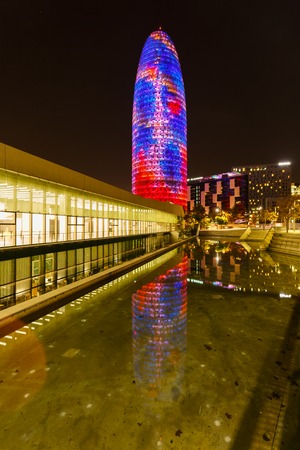 Barcelona, Spain - January 04 2017: Colorful luminous facade of the Agbar tower in the nightのeditorial素材