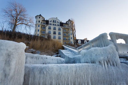 Zelenogradsk, Russia - January 11 2017: The building with ice-covered breakwater in the foreground in winterのeditorial素材