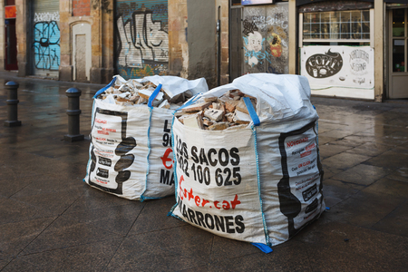 Barcelona, Spain - January 08 2017: Carefully collected construction waste in bags in a street of Gothic Quarterのeditorial素材