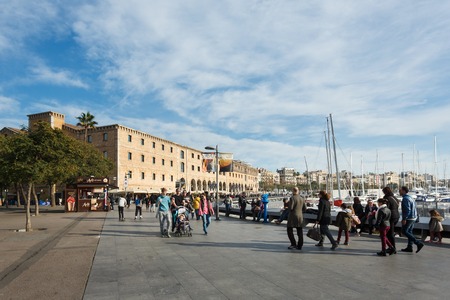 Barcelona, Spain - January 08 2017: People are walking on the promenade near the History Museum of Catalonia at sunny dayのeditorial素材