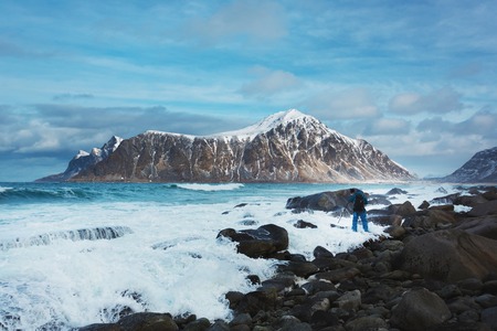 The wave overwhelmed the photographer during the shooting of the winter landscape of the Lofoten Islandsの写真素材