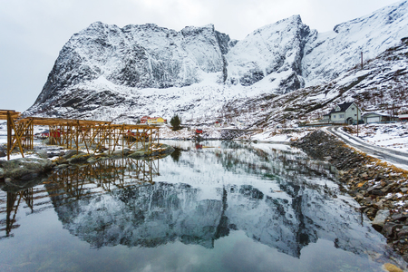 Fishing poles in a bay of the Reine village in the Lofoten islands in winterの写真素材