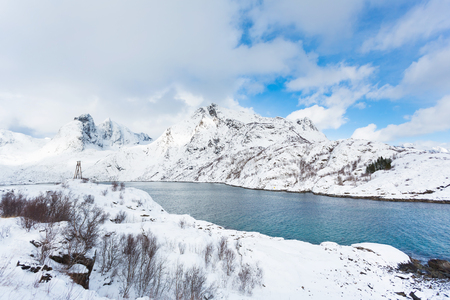 The snowy coast of the Lofoten Islands in winterの写真素材