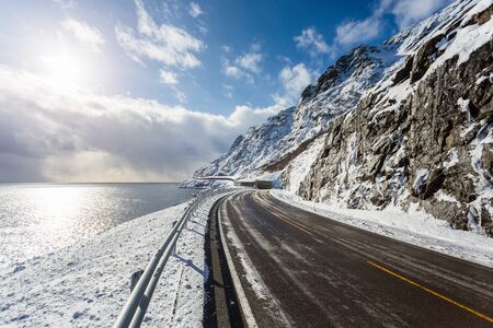 The snowy road in the Lofoten Islandsの写真素材