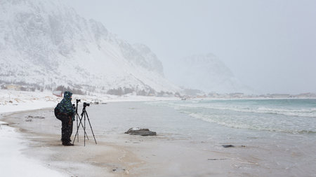 The traveling photographers in the Lofoten Islandsの写真素材