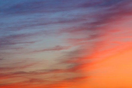 Vibrant sunset clouds in the red skyの写真素材