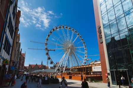 Gdansk, Poland - July 22 2017: Ferris wheel between new buildings in the Gdansk city in summerのeditorial素材