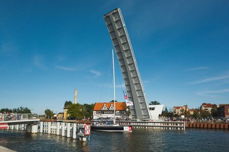 Gdansk, Poland - July 22 2017: People are waiting for the yacht to pass through the drawbridge in the harbor of Gdanskのeditorial素材