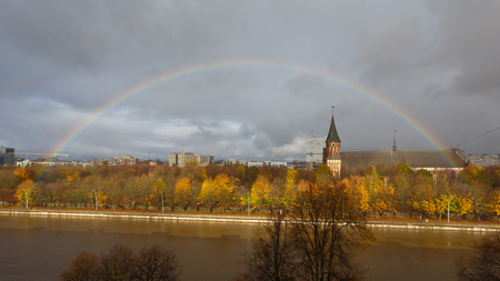 Rainbow over Cathedral in Kaliningrad in autumnの写真素材