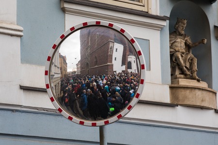 Wroclaw, Poland - January 06 2018: Crowd of people reflected in a mirror on the street of Wroclaw during the celebration of the Three Kingsのeditorial素材