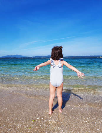 summer day the family has fun on the beachの写真素材
