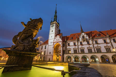 Hercules fountain and the tower of the Olomouc Town Hallの写真素材