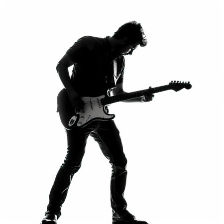 one caucasian man playing guitar silhouette in studio isolated on white background