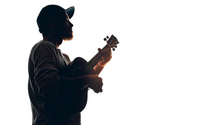 Silhouette of a man playing ukulele on white backgroundのイラスト素材