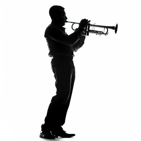silhouette of a man playing trumpet in studio on white background