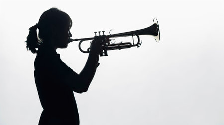 Silhouette of a woman playing the trumpet on a white background