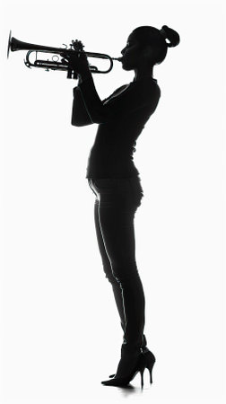 Silhouette of a woman playing the trumpet on a white background