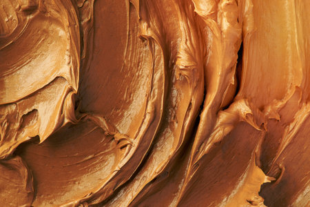 Caramel frosting texture background close-upの写真素材