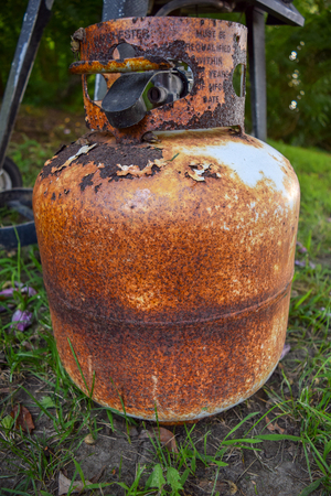 Old and very rusty propane canisterの写真素材