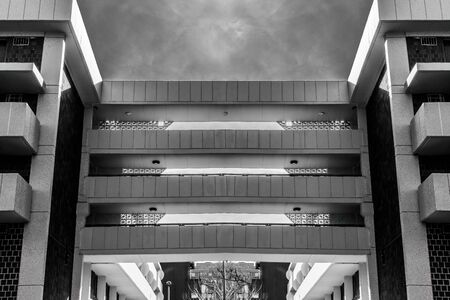 Looking up at the facade of a modern building, Manhattan, New York City, USA, black and white