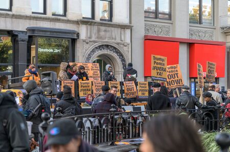 New York City, NY/USA - 11/09/2019: Protesters at an anti-Trump/Pence rally in downtown NYC