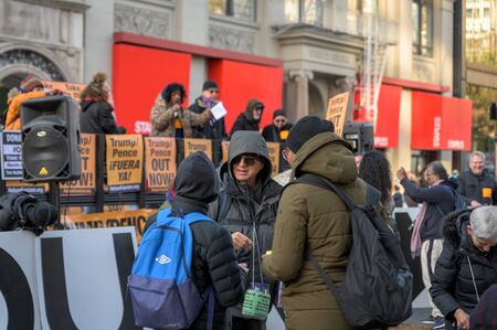 New York City, NY/USA - 11/09/2019: Protesters at an anti-Trump/Pence rally in downtown NYC