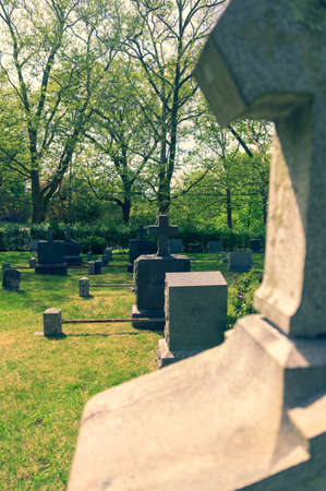 Tombstones at Sleepy Hollow Cemetary on a beautiful sunny day, in Upstate NYの写真素材