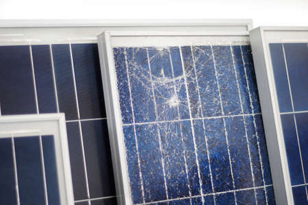 A broken photovoltaic module with others の写真素材