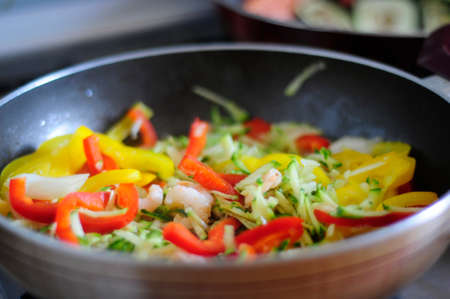 Pan with homemade asian foodの写真素材