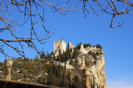 Castle of Arco on the Cliff and old chimney - Trento - Italyの写真素材