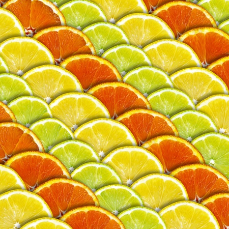 Background with slices of lemon and orangeの写真素材