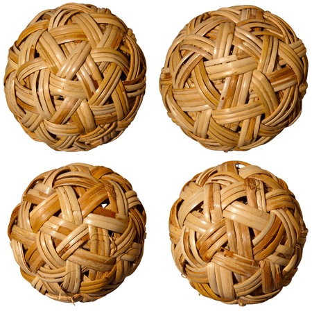 Set of brown woven bamboo balls on white backgroundの写真素材