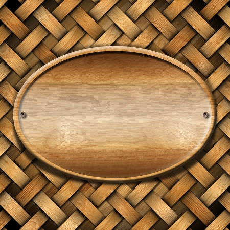 Wooden crisscross diagonal template with oval wooden frameの写真素材
