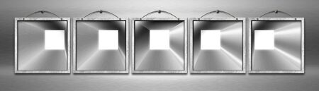 Five blank square metal frames hanging on a metal wall with metal cable