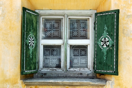 Detail of a typical window with decorations in Zuoz, Engadine Switzerlandの写真素材