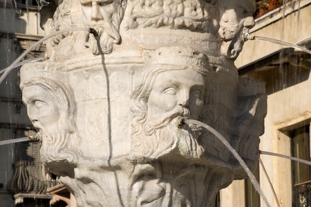 Detail of the fountain of Madonna Verona with heads of kings in Verona - Italyの写真素材