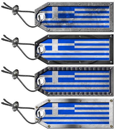 Four grunge metallic tags with Greece flags, steel cable and metal rivetsの写真素材