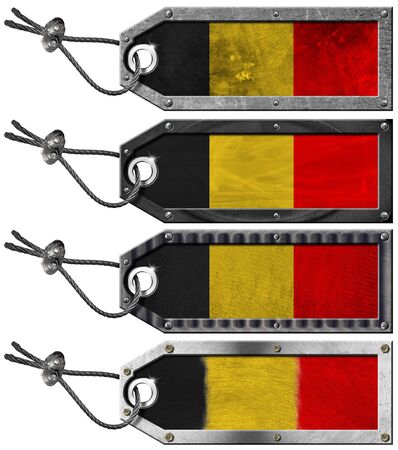 Four grunge metallic tags with belgian flags, steel cable and metal rivetsの写真素材