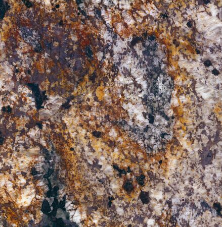 Surface of the granite with white, brown, yellow and black tint for backgroundの写真素材