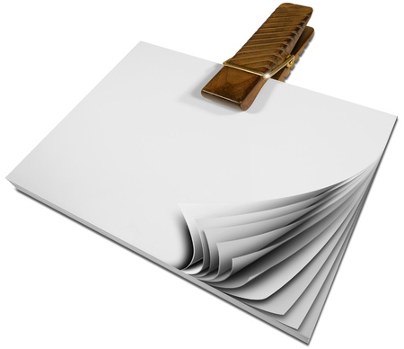Notepad with blank pages held together by large wooden clothespinの写真素材
