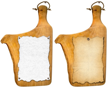Two notebooks for recipes or menu on used wooden cutting boardsの写真素材