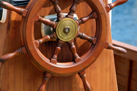 Steering wheel of the old sail shipの写真素材