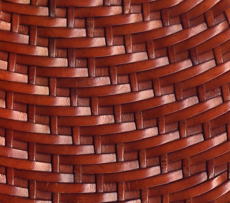 Background with texture of small strips of brown leather braidedの写真素材