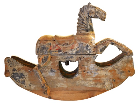 Old brown wooden rocking horse isolated on white backgroundの写真素材