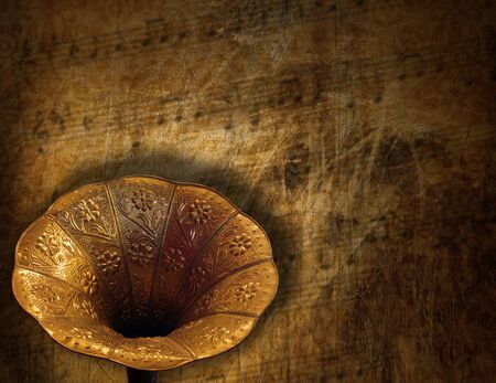 Aged horn gramophone on a grunge brown backgroundの写真素材