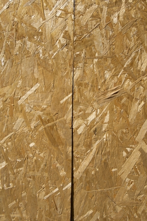 Closeup image of pressed wood texture - recycle wood boardの写真素材