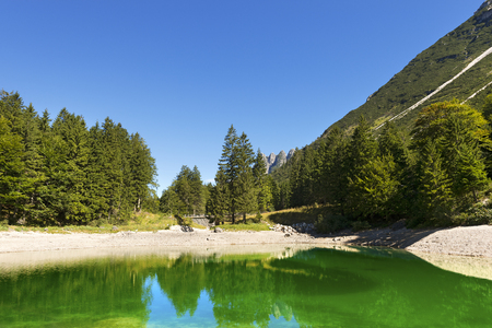 Beautiful alpine lake in north Italy - Predil lake - Julian Alps in Italyの写真素材