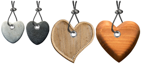 Four hearts of stone and wood with steel cable isolated の写真素材