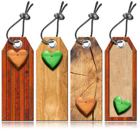 Four empty wooden tags with wooden hearts, steel cable and metal rivets
の写真素材
